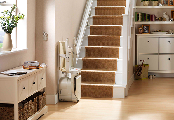 stairlift folded at bottom on straight staircase
