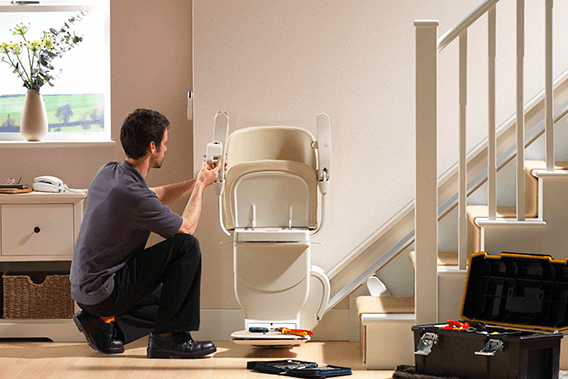 Fast straights siena stairlift at bottom with ivory upholstery