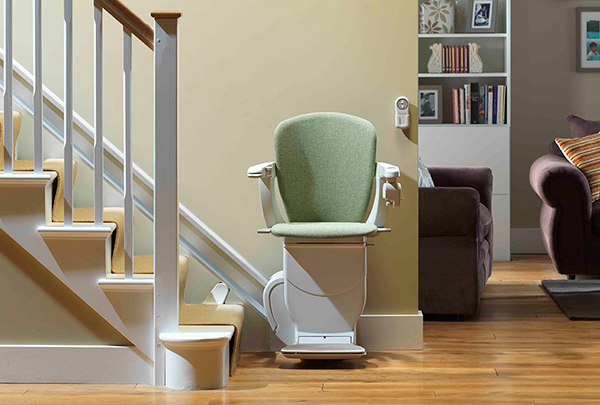 Reconditioned Stannah stairlift with green seat